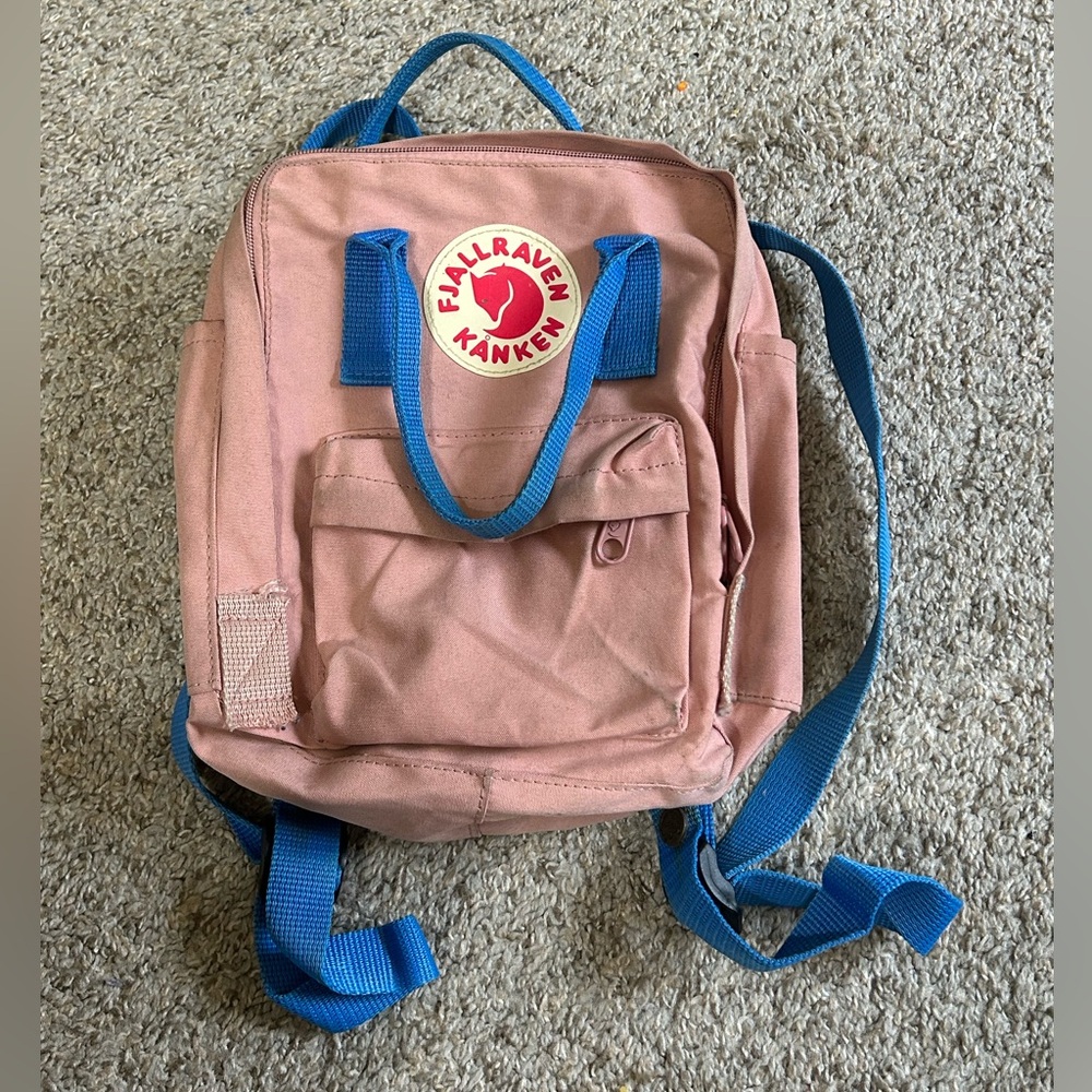 KÅNKEN SLING Mini Backpack Soft Pink Blue Accents Travel Outdoor Hiking Pockets